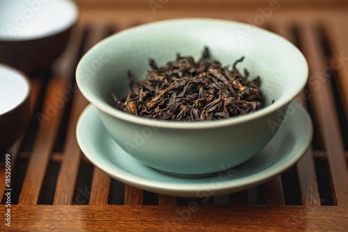 Chinese tea ceremony, da hong pao oolong tea in gaiwan or tea-cup 