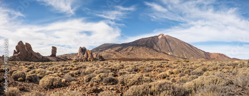Panoramic view of volcano Teide and Rogues del Garcia in Teide national park. Copy space in sky.