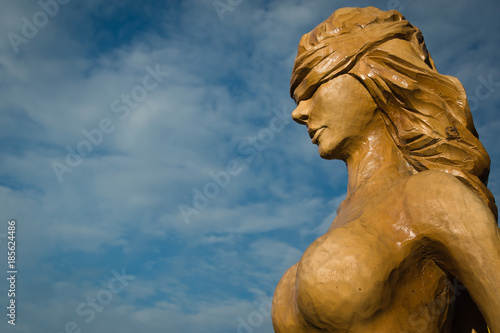 Wooden statue of the idol.