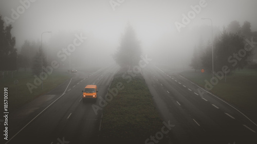 Car foggy road