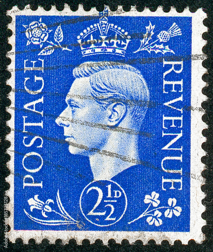 Ukraine - circa 2017: A postage stamp printed in United Kingdom shows picture portrait King George VI. Circa 1941.