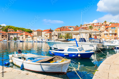 Fishing boats in Milna port on sunny summer day, Brac island, Croatia