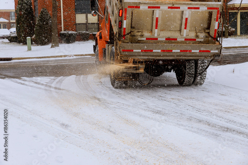 municipal car for sprinkle half the salt and sand on roads with snow machine for sprinkling sand roads