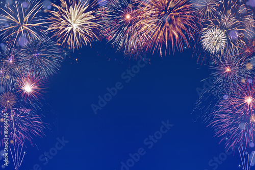 colourful fireworks background with space in the middle