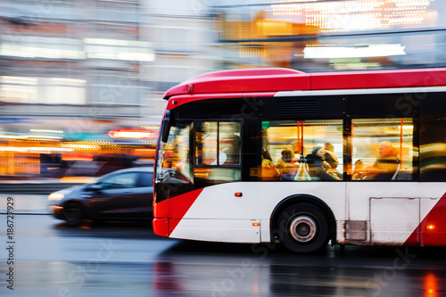 driving bus in the city at night