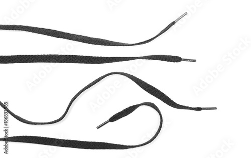 Black shoelaces isolated on white background, top view