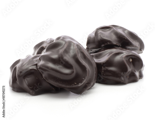 Four dark chocolate-coated zefir isolated on white background.