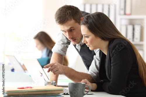 Office coworkers working together