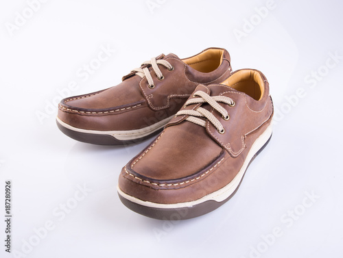 shoe or brown color men's shoes on a background.