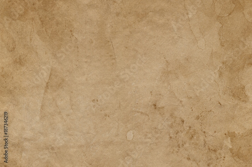 Empty stained old brown paper surface. Abstract background