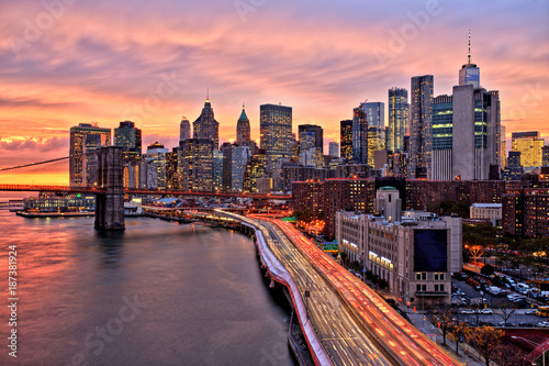 View of Lower Manhattan with Brooklyn Bridge at Sunset, New York City