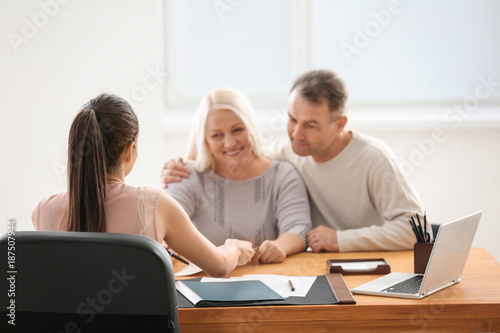 Mature couple at notary public office