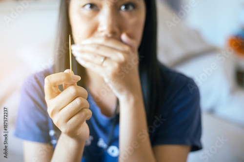 Close up of woman using toothpick