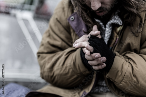 Close-up of dirty beggar's hands