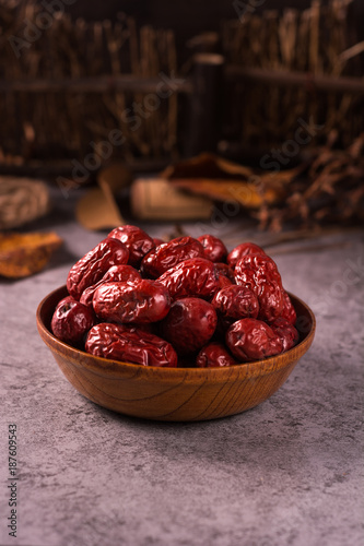 Dried jujube fruit on wooden table