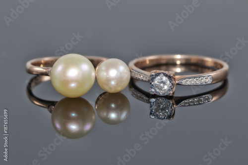 Gold ring with diamond and ring with pearls