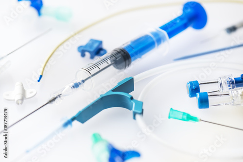 Close up image of syringe ,needle and central venous pressure catheter measurement kit