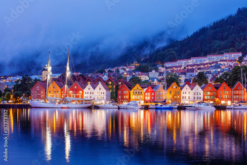 Bergen street at night with boats in Norway