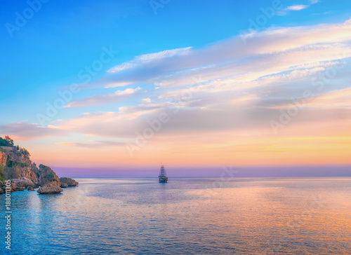 Tall ship sailing on the sea in the evening sunlight, Mediterranean sea, Turkey