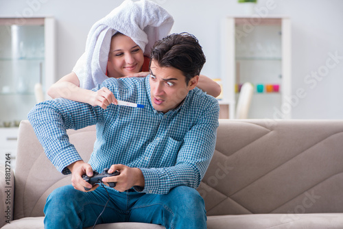 Wife and husband looking at pregnancy test