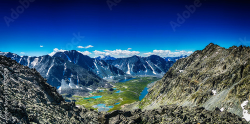 view on mountain range with valley, mountain lakes and river, national park in Altai republic, Siberia, Russia