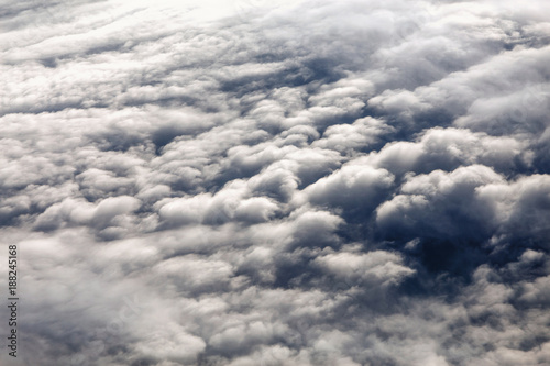 Clouds seen from airplane, concept of weather and climate change, cyclones and anticyclones