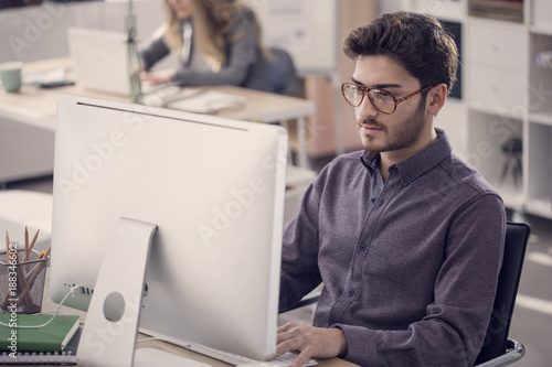 Man in front of computer