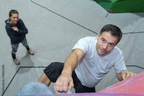 man doing free wall climbing