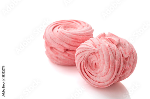 Homemade pink zephyr or marshmallow isolated on white