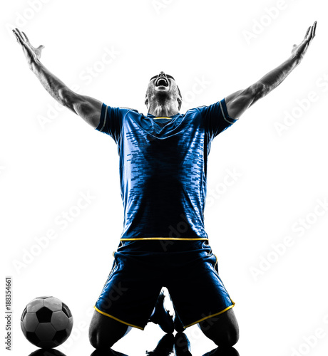 one caucasian soccer player man happy celebration in silhouette isolated on white background