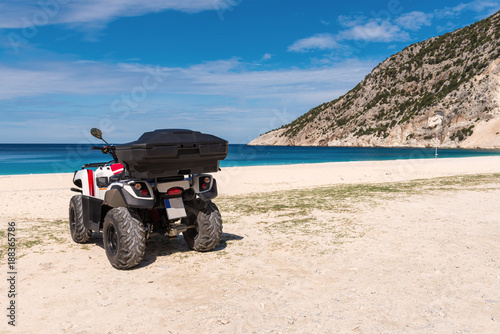 Quad parked on the beach of Myrtos. Quad is very popular means of transport on Kefalonia island. Greece.
