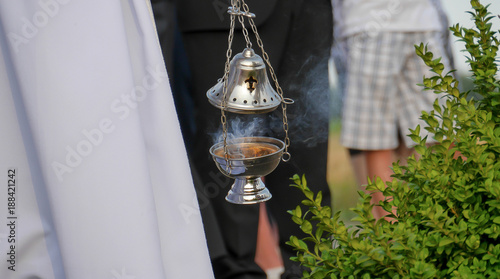 ordination of the chapel by Catholic priest censer rite smoke