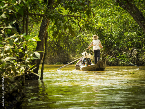 Tourists in a boat in Mekong delta