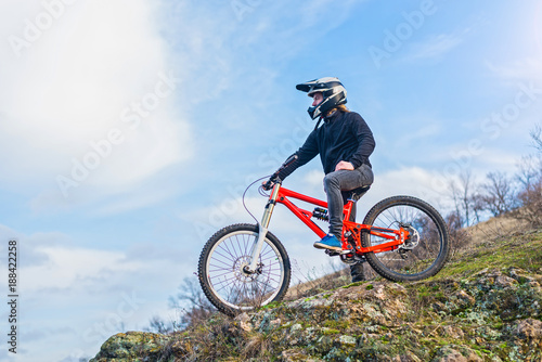 Cyclist on the mountain bike, free space for your text.