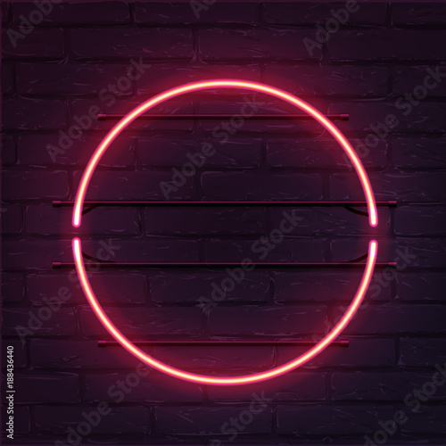 Circle pink neon sign. Vector realistic neon circle on brick wall.