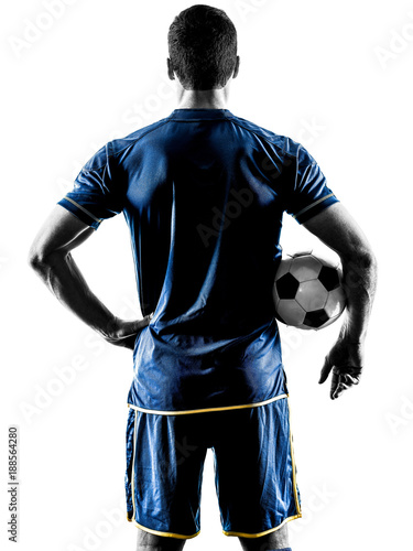 one caucasian soccer player man standing Rear View in silhouette isolated on white background