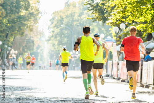  Athletes run in the park on the running marathon