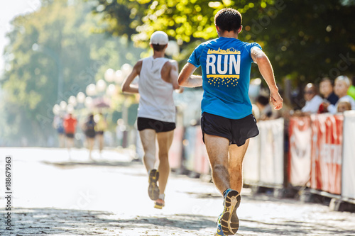  Athletes run in the park on the running marathon