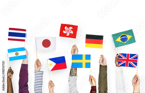 Hands holding nationality flags