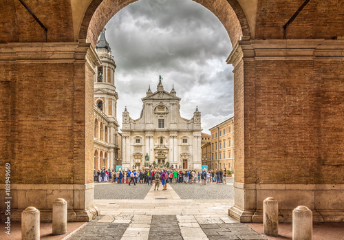 Sanctuary of the Holy House of Loreto, Marches, Italy, the Basilica facade with the Sisto V monument in the foreground