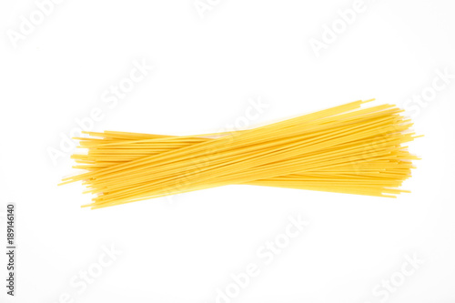 Uncooked pasta spaghetti macaroni isolated on white background