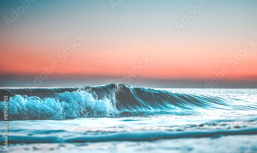 wave at sunset
