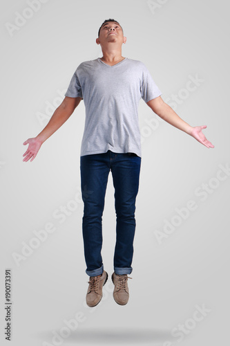 Levitation. Young Man Walking Jumping on Air