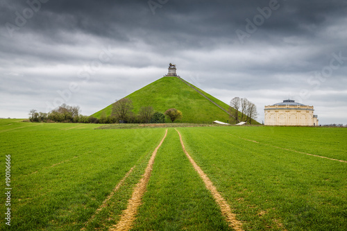 Famous Battle of Waterloo Lion's Mound memorial site with dark clouds, Belgium