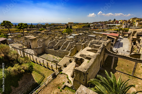 Italy. Ruins of Herculaneum (UNESCO World Heritage Site) - general view. There are the Palestra in the foreground and Decumanus Maximus in the right