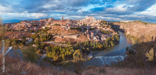 Panorama of Old city of Toledo and river Tajo in the overcast day, Castilla La Mancha, Spain