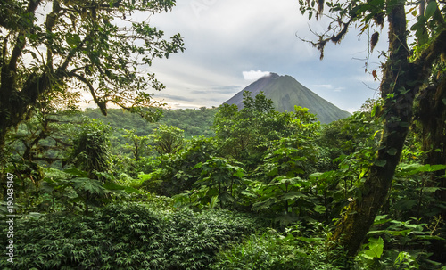 Volcan Arenal rises out of the jungle and dominates the landscape near the town of La Fortuna, Costa Rica.