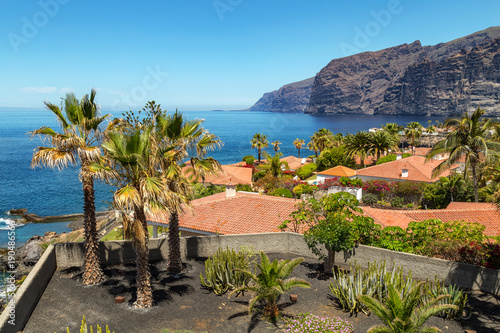 Giant rock formations known as Acantilados de Los Gigantes, located in Los Gigantes, a resort town in the Santiago del Teide municipality on the west coast of the Canary Island Tenerife, Spain