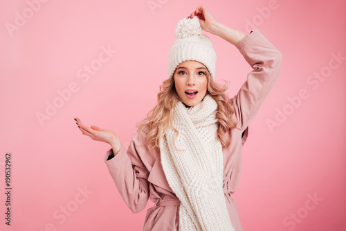 Happy young woman wearing warm scarf