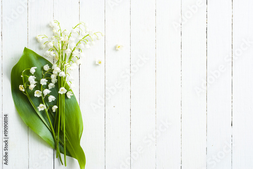 Lily of the valley on white wooden